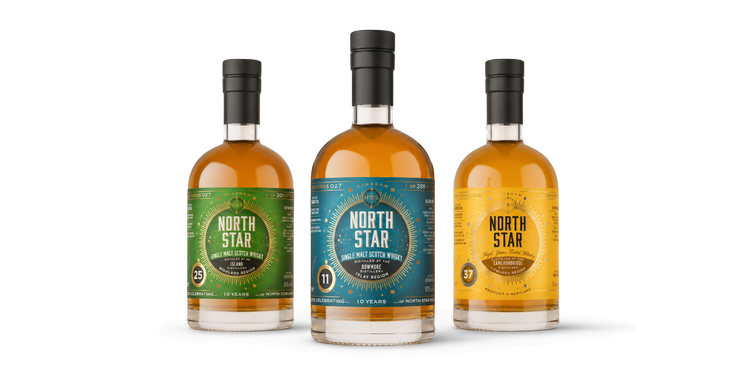 A bottle of North Star 25 Year Old Scotch whisky on a white background with a warm orange glow effect. The bottle is filled with amber liquid and features a black label with gold and orange text.